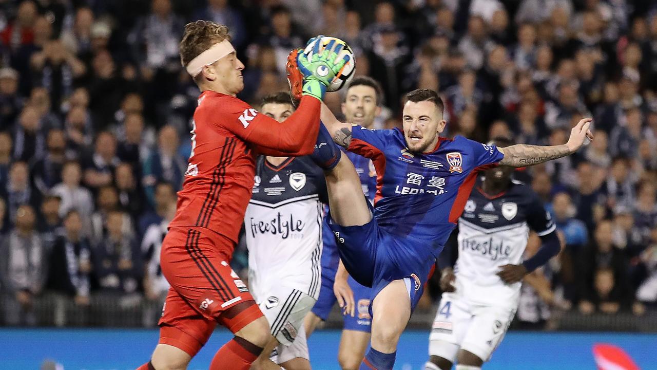 Roy O'Donovan collides with Lawrence Thomas during the 2018 A-League Grand Final.