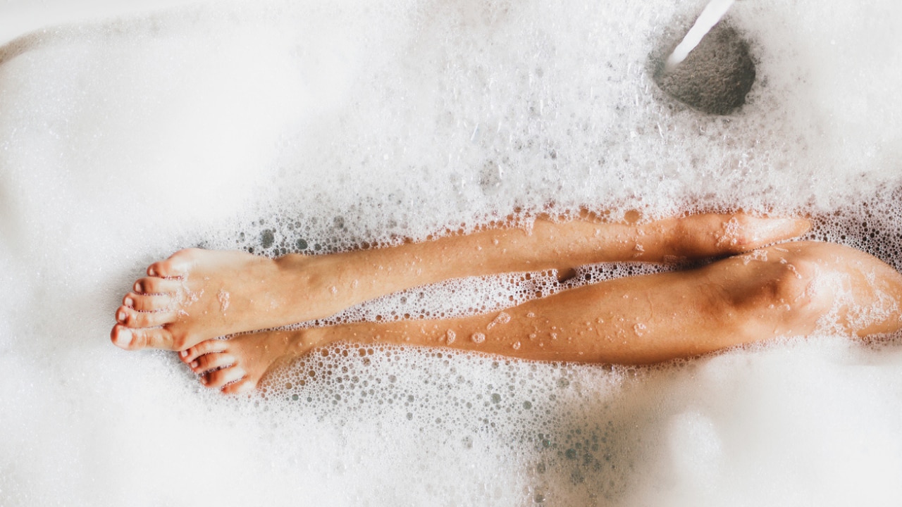 Try pleasure time in the bath with some Epsom salts. Image: iStock