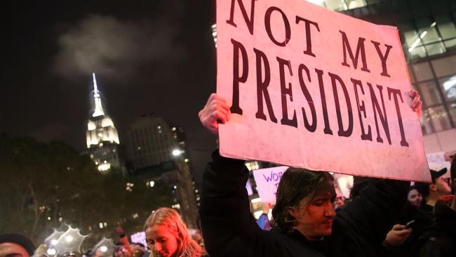 NEW YORK, NY - NOVEMBER 9: Hundreds of anti-Donald Trump protestors march through the street on 6th Avenue on their way to Trump Tower, November 9, 2016 in New York City. Republican candidate Donald Trump won the 2016 presidential election in the early hours of the morning in a widely unforeseen upset. Drew Angerer/Getty Images/AFP == FOR NEWSPAPERS, INTERNET, TELCOS & TELEVISION USE ONLY ==