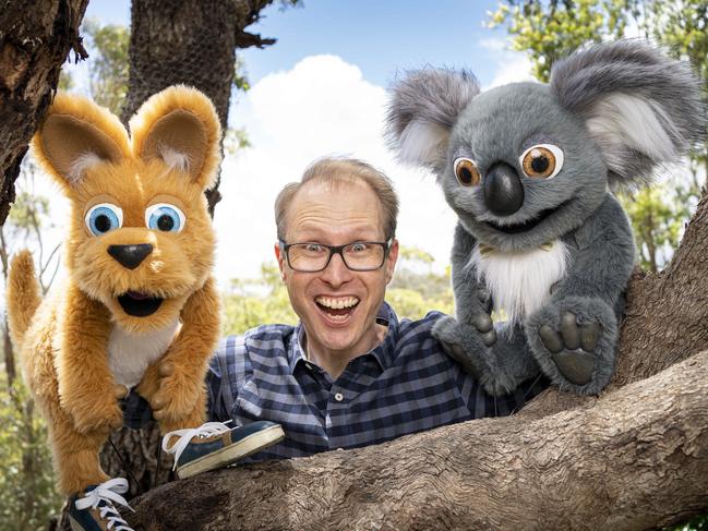 Luke Spencer Tregloan, prior to his arrest, with two of the puppets that starred in the education app he co-created.