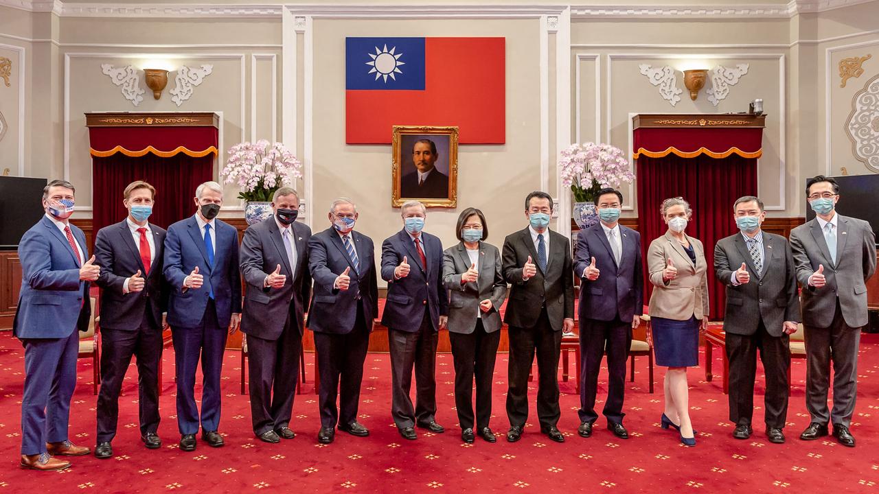 The bipartisan group of US politicians pose for a photo with Taiwanese officials. Picture: Taiwan Presidential Office/AFP