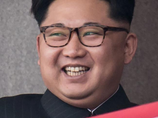 (FILES) A file photo taken on May 10, 2016 shows North Korean leader Kim Jong-Un watching a military parade and mass rally on Kim Il-Sung square in Pyongyang. North Korea threatened on June 28, 2017 to "impose the death penalty" on the South's former president Park Geun-Hye over an alleged plot to assassinate its leader Kim Jong-Un. / AFP PHOTO / ED JONES / XGTY