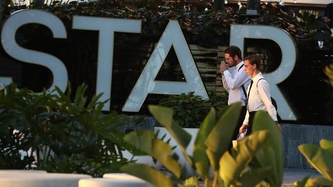 Staff leaving The Star Gold Coast after the company announced they were cutting 20 per cent of 2000 salaried staff. Photograph: Jason O'Brien