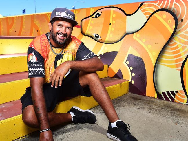 Artist Nicky Bidju Pryor, Bidju Designs, in front of his latest collaboration at Riverway Skate Park. Picture: Shae Beplate.