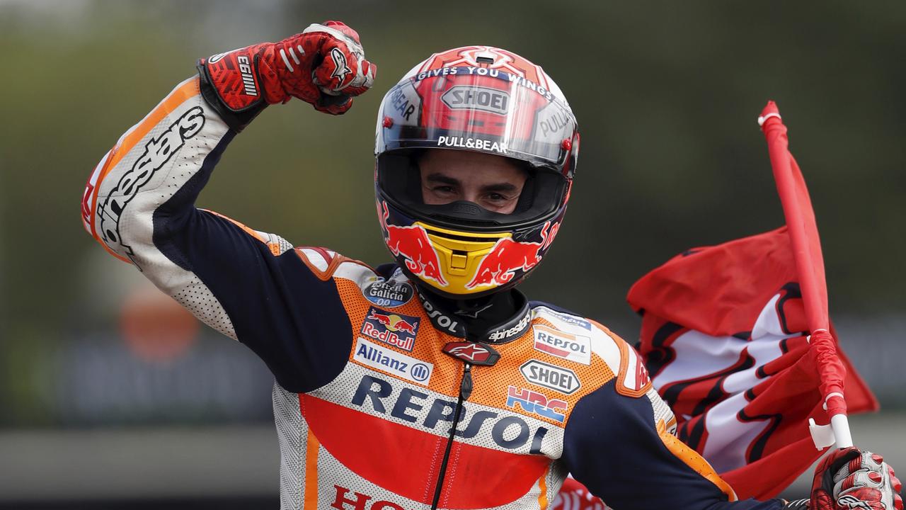 Spain's Marc Marquez celebrates his sixth MotoGP victory this year.