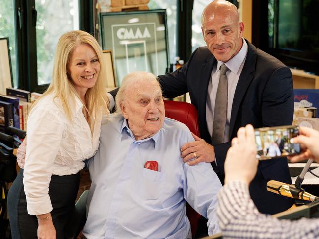 Despina Priala and George Caralis congratulate radio star John Laws at the end of his final show on 2SM. Picture: Max Mason-Hubers