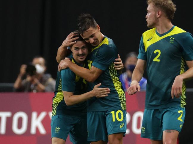 Marco Tilio celebrates after scoring a stunner against Argentina at the Olympics.