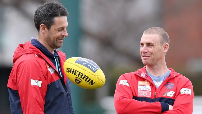 New Norwood SANFL coach Jade Rawlings with Melbourne coach Simon Goodwin .