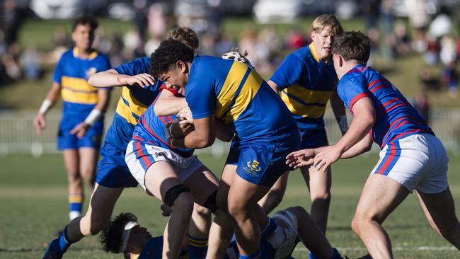 Jeremiah Sialau attempts to get possession for Grammar. Picture: Kevin Farmer