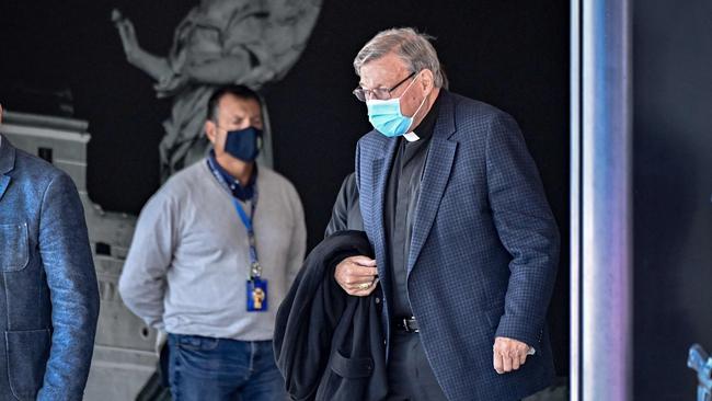 Cardinal George Pell arrives at Rome’s Fiumicino airport last month. Picture: AFP