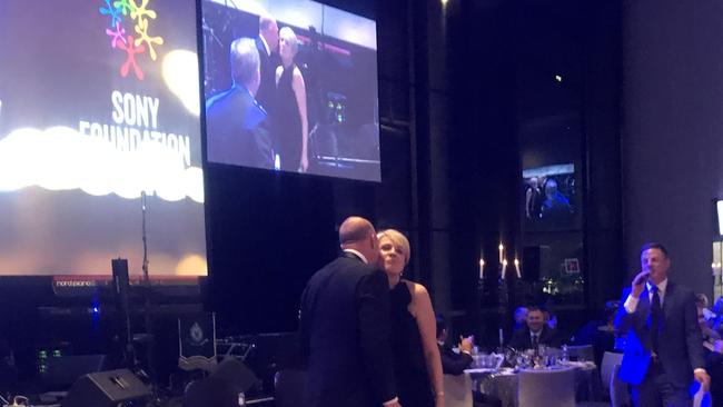 MC Ben Fordham (right) watched the $5000 kiss between Peter Dutton and Tanya Plibersek.