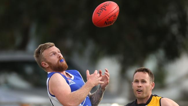 Captain Shaun Jackson marks for Moorabbin.