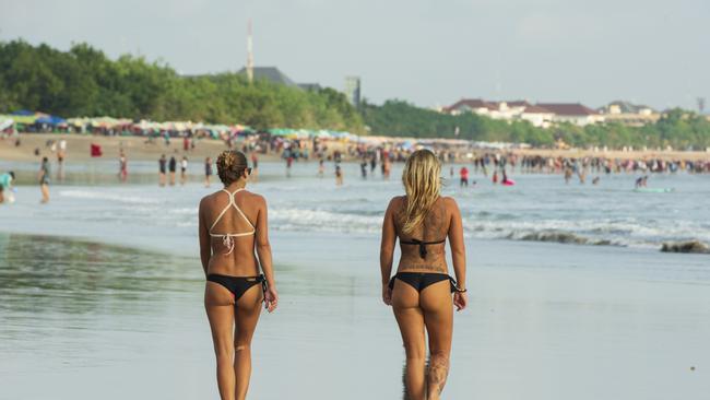 Kuta beach - Bali - Idonesia . May  14, 2017. Kuta is a beach that attracts visitors quite well. An important travel destination in the world for surfing. Tourists are walking on the beach.