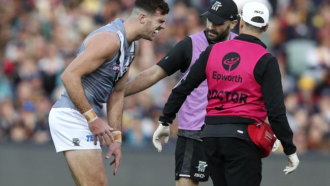 Scott Lycett leaves the field after he collided with Josh Jenkins in the ruck. Picture Sarah Reed