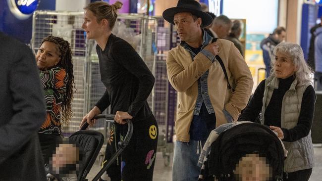 The actor and his wife were seen walking through the airport with their two children. Picture: Backgrid Australia