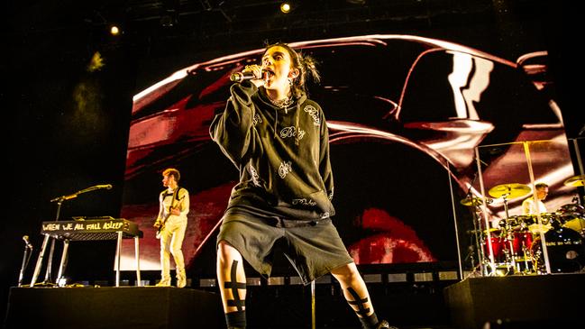 Billie Eilish works the stage in Melbourne, Finneas on guitar. Pic Jaz Meadows