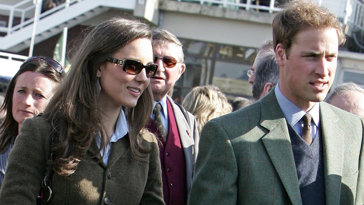 Kate and William in the paddock enclosure on the first day of the Cheltenham Race Festival in March 2007. Picture: AFP PHOTO/Carl DE SOUZA