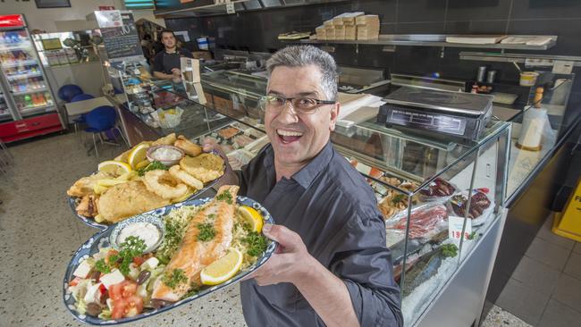 Tony Moussa celebrates at Seafood on Evans, which has been crowned the best fish and chips in the state. Picture: Rob Leeson