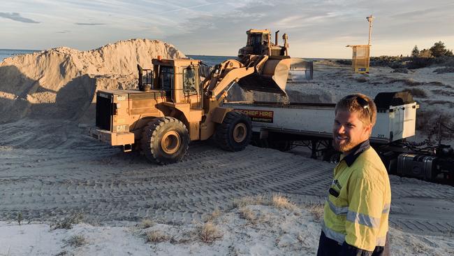 Sand carting at Semaphore, to be used at West Beach. Picture: AAP / Dean Martin