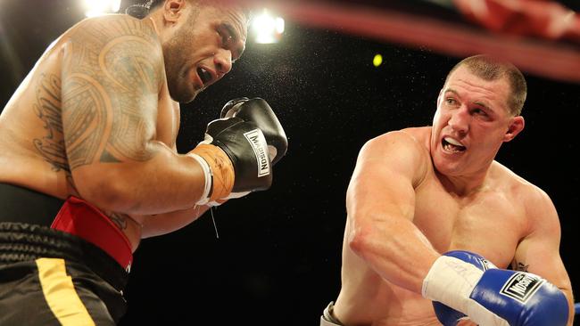 Cronulla captain Paul Gallen (right) in action against Canberra’s Junior Paulo on Friday night.