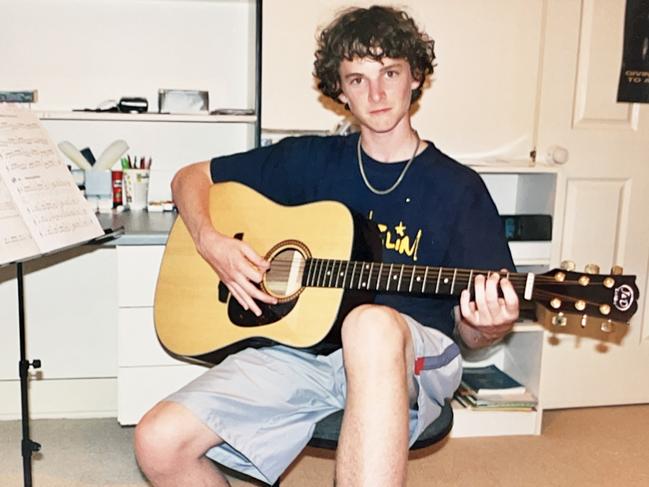 The author at age 16, with his acoustic guitar. Picture: Paul McMillen