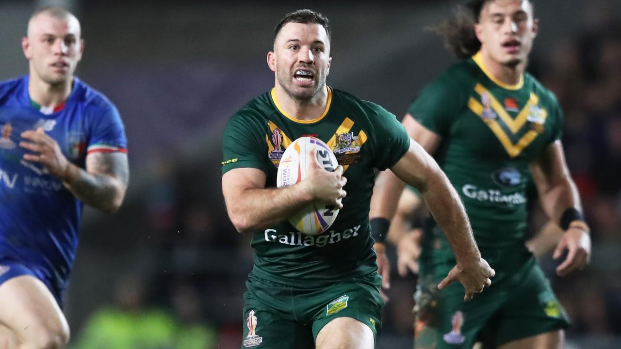 ST HELENS, ENGLAND - OCTOBER 29: James Tedesco of Australia breaks with the ball during Rugby League World Cup 2021 Pool B match between Australia and Italy at Totally Wicked Stadium on October 29, 2022 in St Helens, England. (Photo by Jan Kruger/Getty Images for RLWC)