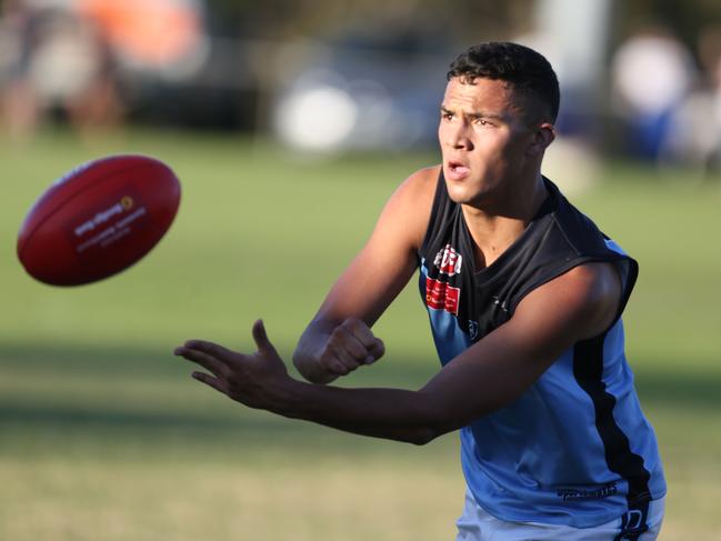 EDFL footy: Avondale Heights v Aberfeldie ( light blue )52 for Aberfeldie Samuel Paea handballs the ball.Picture: Stuart Milligan