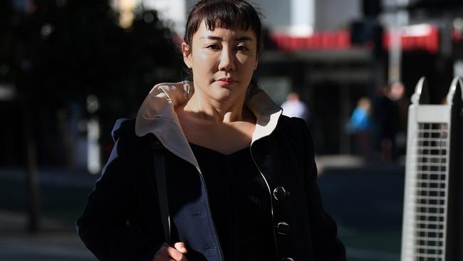 Yutian Li arrives at the trial. (AAP Image/Dan Peled)