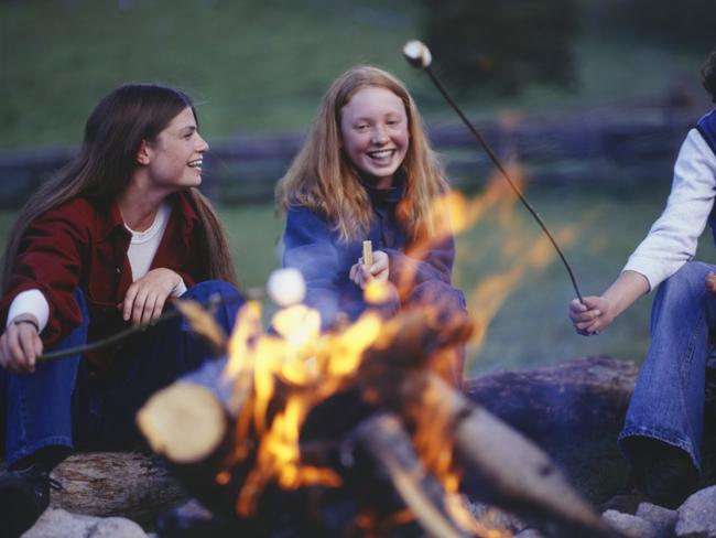 There is nothing quite like sleeping under the stars and roasting marshmallows over a campfire. stock photo