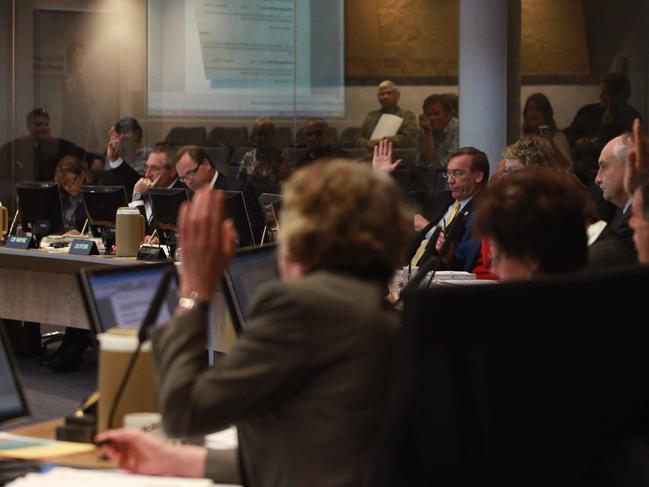 Counsellors discuss Allconnex at the Council Chambers, Evandale.