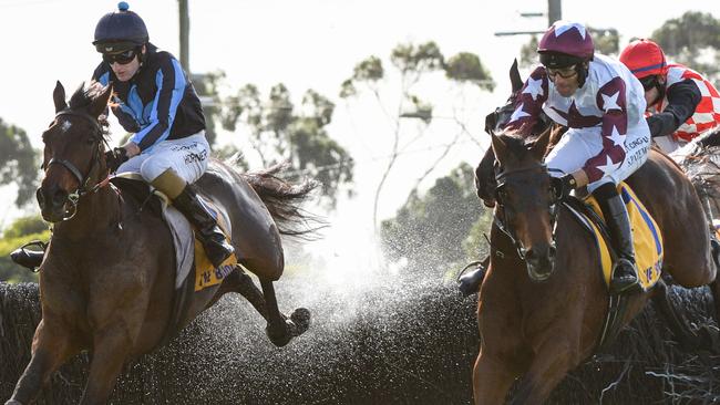 Bit Of A Lad (right) matching motors with Flying Agent in the 2021 Brierly Steeplechase. Picture: Getty Images