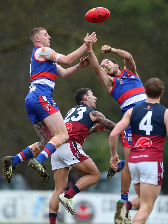 Gisborne pair Jack Scanlon and Brodie Montague battle for the ball.