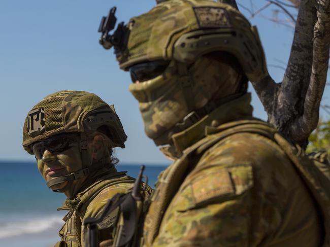 Australian Army soliders conduct reconnaisance of the amphibious landing craft during the Combined Force Entry Operation to simultaneously secure objectives by both surface and air mobile forces on Exercise Talisman Sabre 19. The amphibious landing took place July 16, 2019 at Langhamâ€™s Beach in Stanage Bay, Queensland. (U.S. Marine Corps photo by Lance Cpl. Kaleb Martin) *** Local Caption *** Talisman Sabre 2019 (TS19) is a bilateral combined Australian and United States (US) training activity.   TS19 is designed to practice our respective military services and associated agencies in planning and conducting Combined and Joint Task Force operations, and improve the combat readiness and interoperability between Australian and US forces.  TS19 will be the eighth iteration of the exercise and consists of a Field Training Exercise incorporating force preparation (logistic) activities, amphibious landings, land force manoeuvre, urban operations, air operations, maritime operations and Special Forces activities.