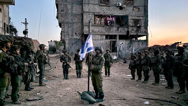 Israeli soldiers operating in the Gaza Strip are pictured attending a ceremony as part of the national Memorial Day for fallen soldiers of Israel's wars and victims of attacks. A ceasefire that leaves Hamas in place – what much of the world, the Albanese government included, has been misguidedly calling for – would frustrate the opportunity for regional peace. Picture: AFP PHOTO / Handout / Israeli Army