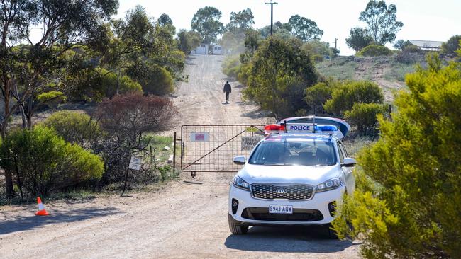 SA Police undertaking a large-scale search of a property in the Murray Mallee with an excavator in a bid to locate evidence believed to be linked with two murder inquiries. Picture: AAP / Brenton Edwards