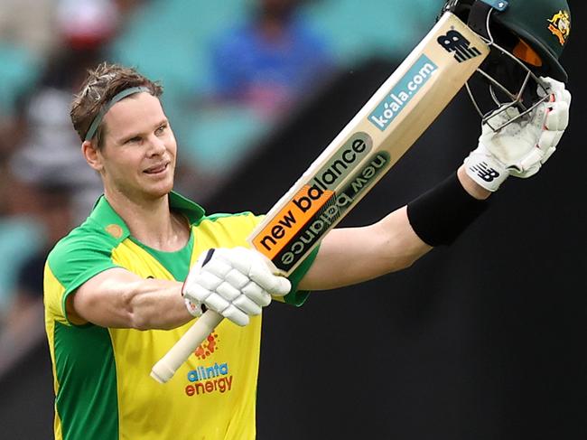 SYDNEY, AUSTRALIA - NOVEMBER 29: Steve Smith of Australia celebrates making 100 runs during game two of the One Day International series between Australia and India at Sydney Cricket Ground on November 29, 2020 in Sydney, Australia. (Photo by Cameron Spencer/Getty Images)