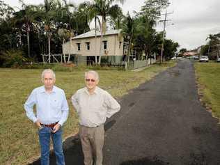 PLAYING IT SAFE: Michael Wood and Bill Moorhouse from the Richmond River County Council in a flood-affected area in North Lismore. Picture: Doug Eaton