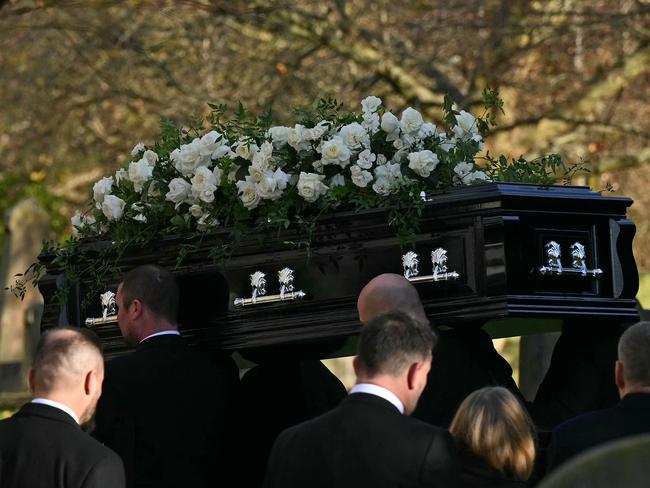 Pallbearers carried his coffin into the church ahead of his funeral service in Amersham. Picture: Justin Tallis/AFP