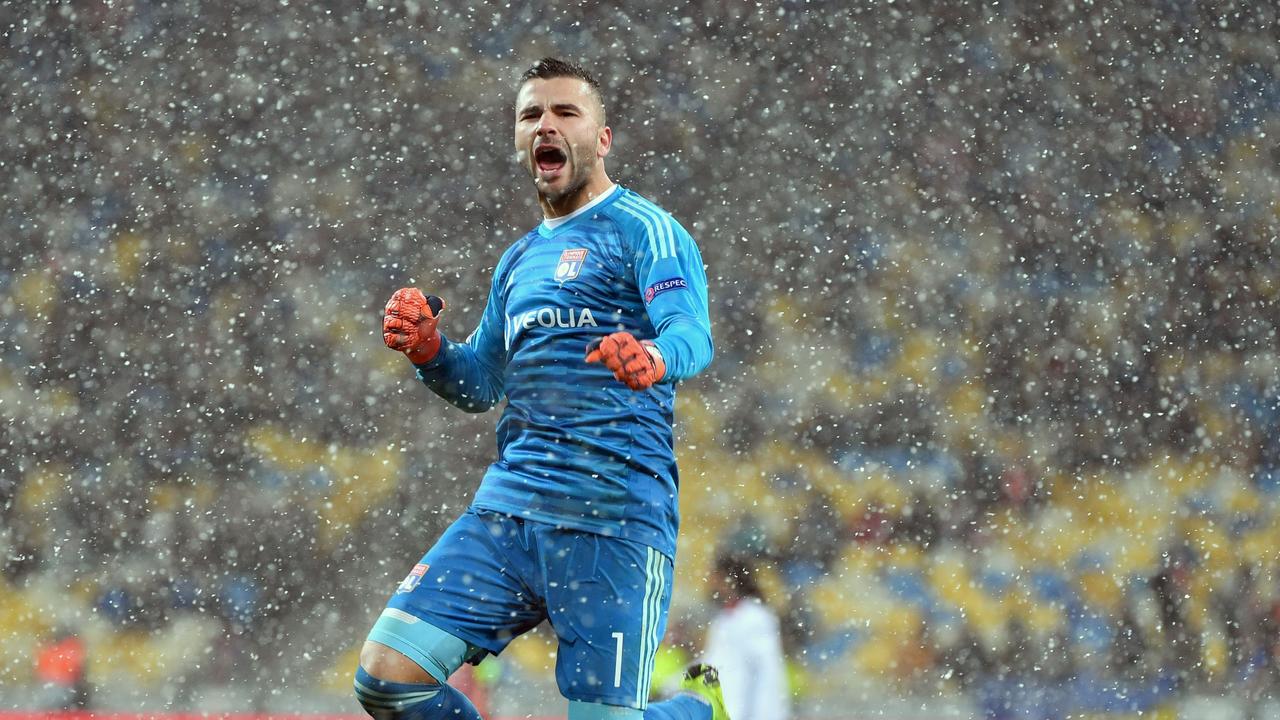 Lyon's Portuguese goalkeeper Anthony Lopes reacts after his side clinched progression.