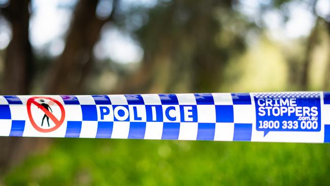 Police tape at the entrance to Shearer Park in Lansvale where 3 people tragically drowned on Saturday.Photo: Tom Parrish