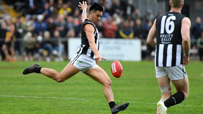 Michael Tang in action for Wallan.