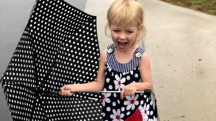 Matilda Hancock having some fun in the rain on Saturday in Park Avenue. Picture: Sally Hancock