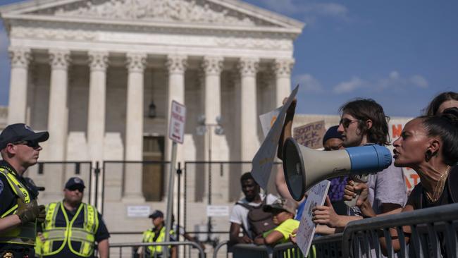 Abortion-rights activists outside the Supreme Court in Washington late on Sunday. Picture: Getty Images