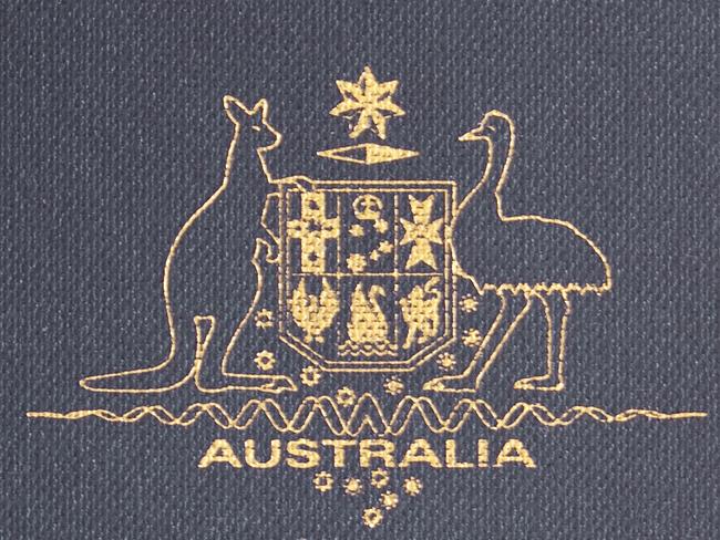 Sydney, Australia - March 5, 2012: A biometric Australian passport, isolated on a white background.