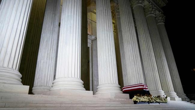 The flag-draped casket of Justice Ruth Bader Ginsburg lies in repose under the Portico at the top of the front steps of the US Supreme Court building in Washington, DC on September 23.