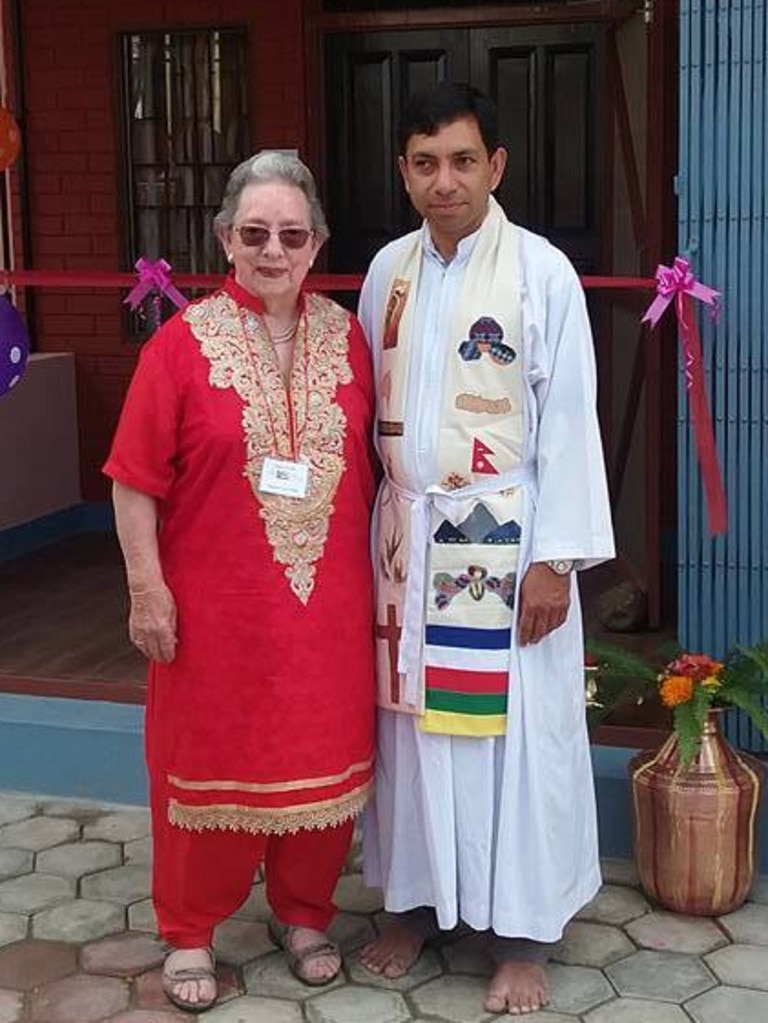 Joan Correll with Father Thomas Karamakuzhiyil. Pictures: Supplied