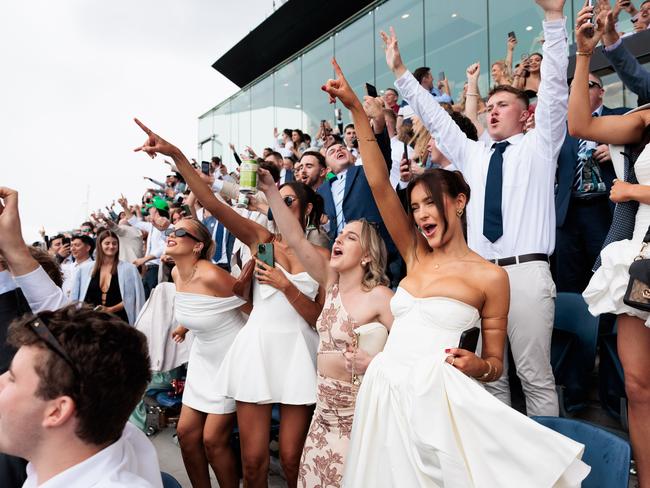 Racegoers cheering on. Picture: Chris Huang / Matrix