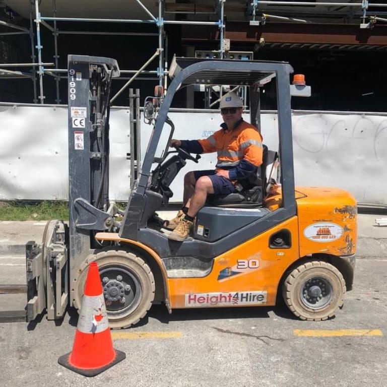 Craig Field driving a forklift on the Gold Coast