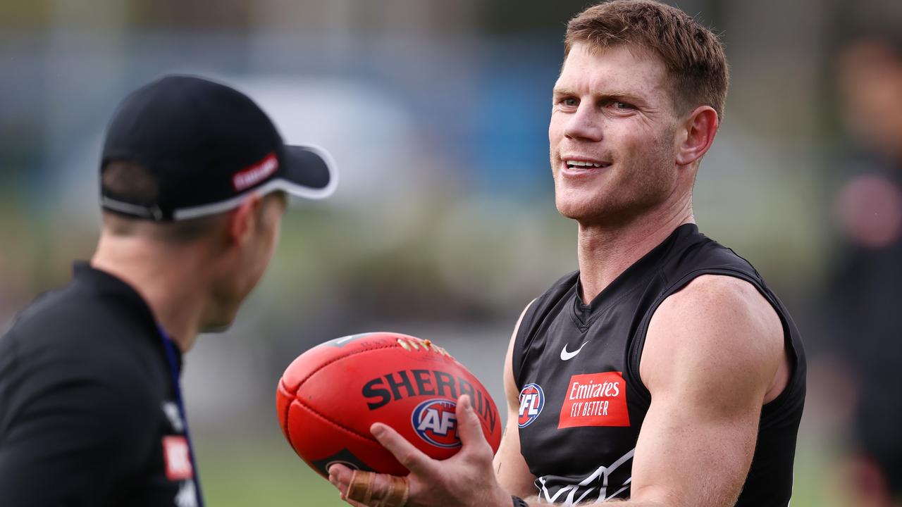 Taylor Adams was cheerful at training last Thursday as he jogged and participated in short kicking drills. Picture: Michael Klein.