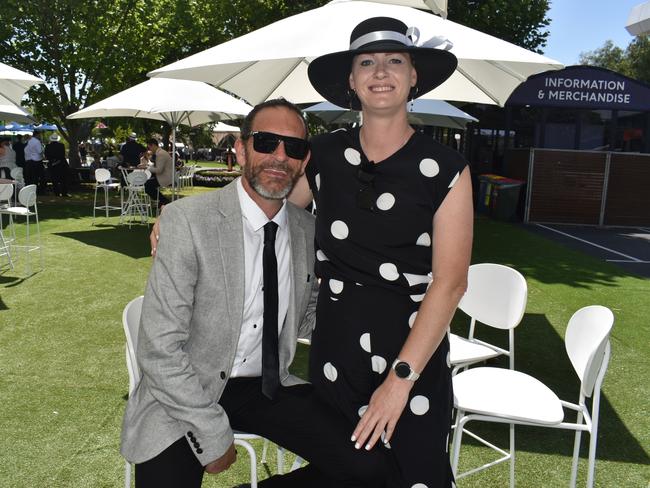 Guests in striking racewear at Penfolds Derby Day at the Flemington Racecourse on Saturday, November 02, 2024: Steven Blake and Hannah Blake. Picture: Jack Colantuono